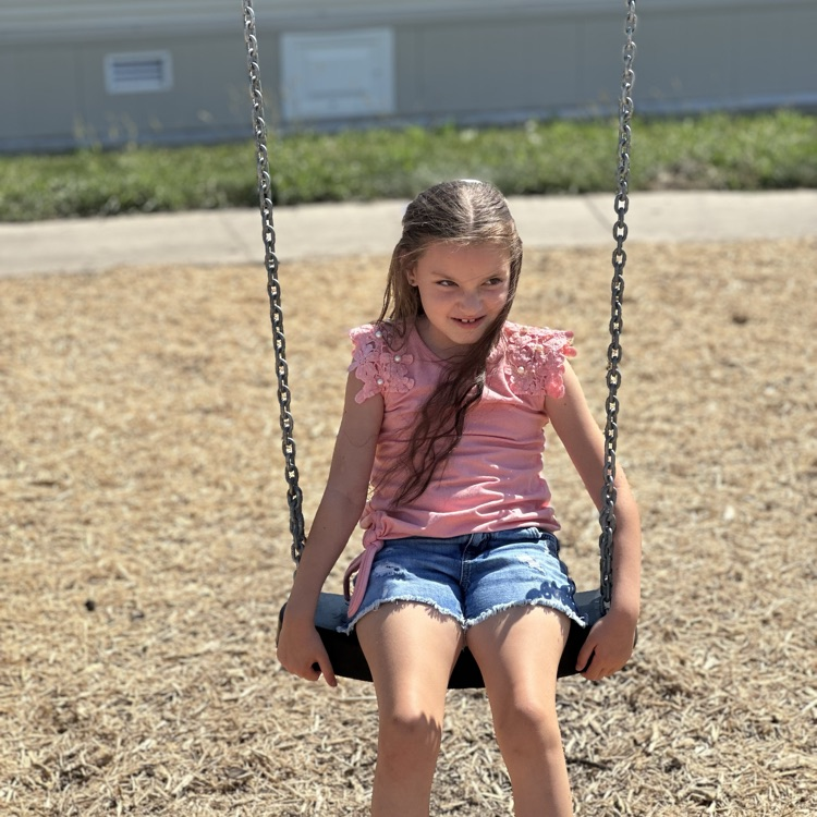 child on swing
