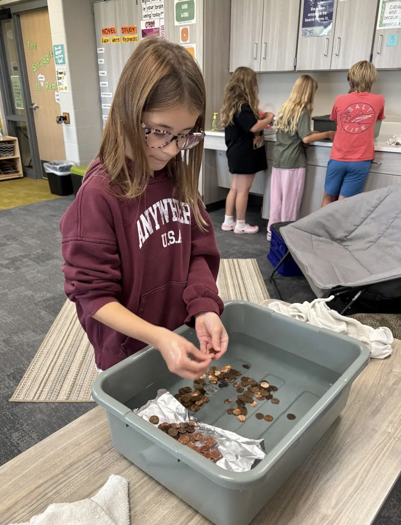 student working on a floating stem boat 