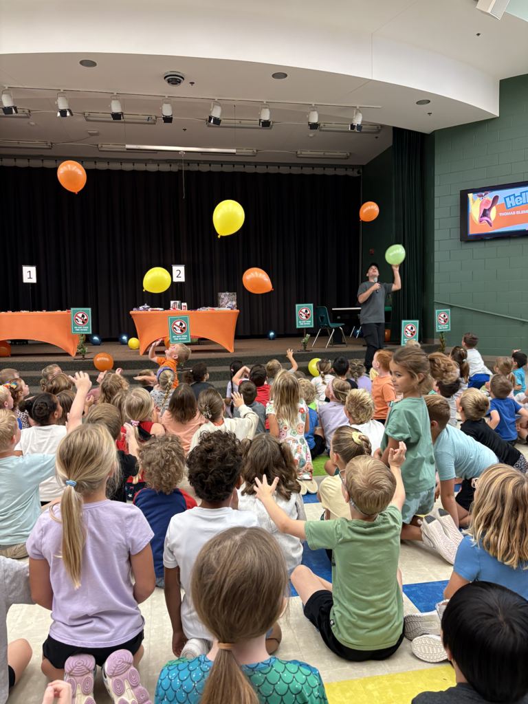 Author, Justin Colon, gets kids excited to learn about being an author.