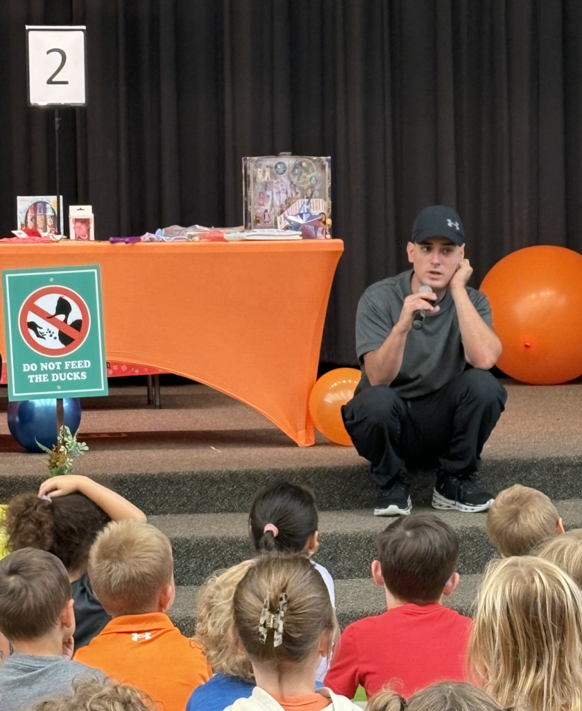 Author, Justin Colon, speaking to students.