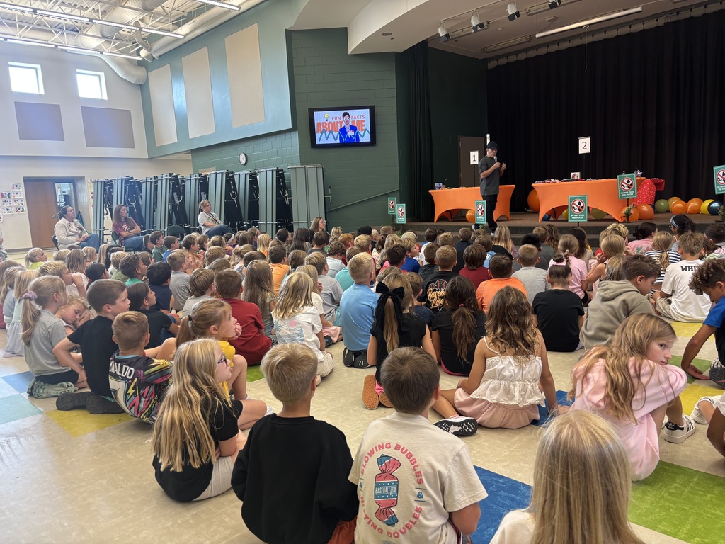 Justin Colón telling our second and third graders about his many talents!