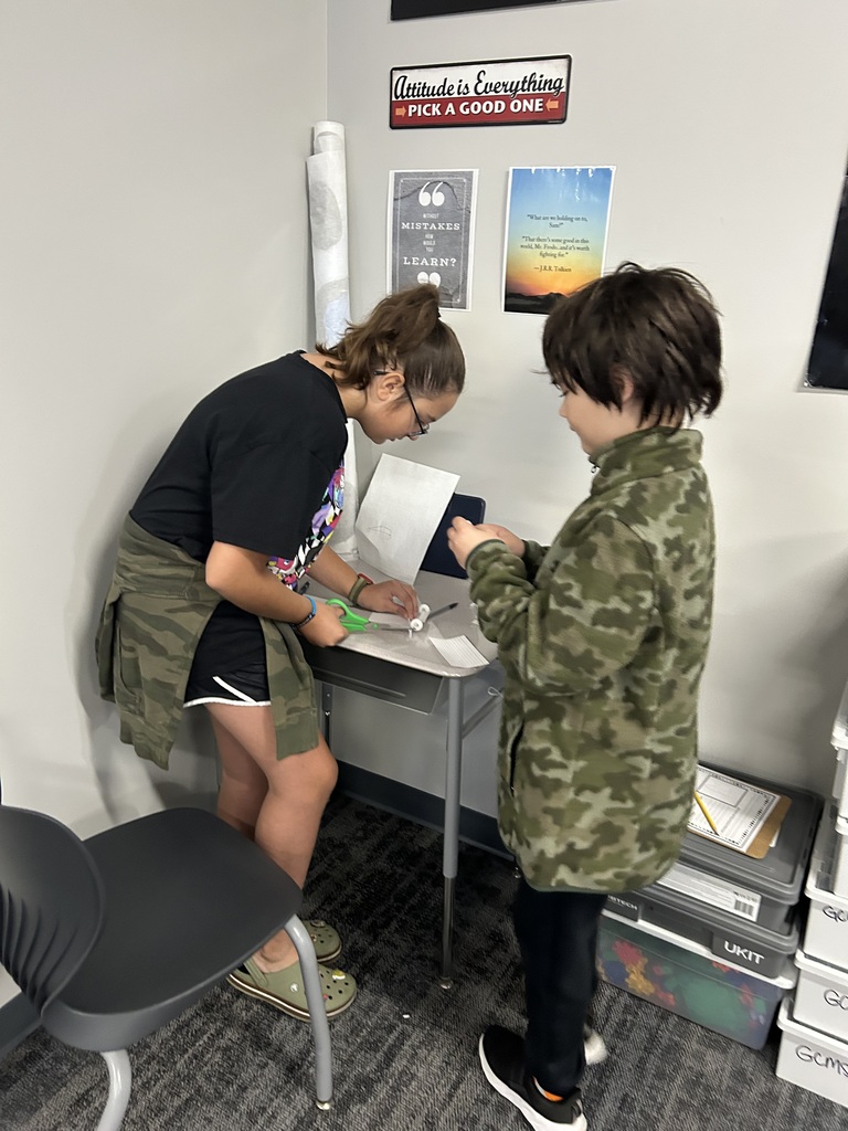 Students are working on making their wind puft cars. 