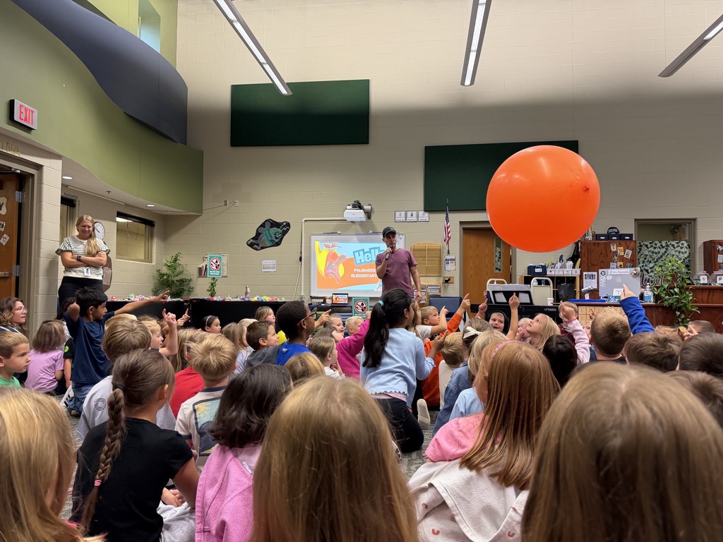 Justin Colón and kids with giant balloon