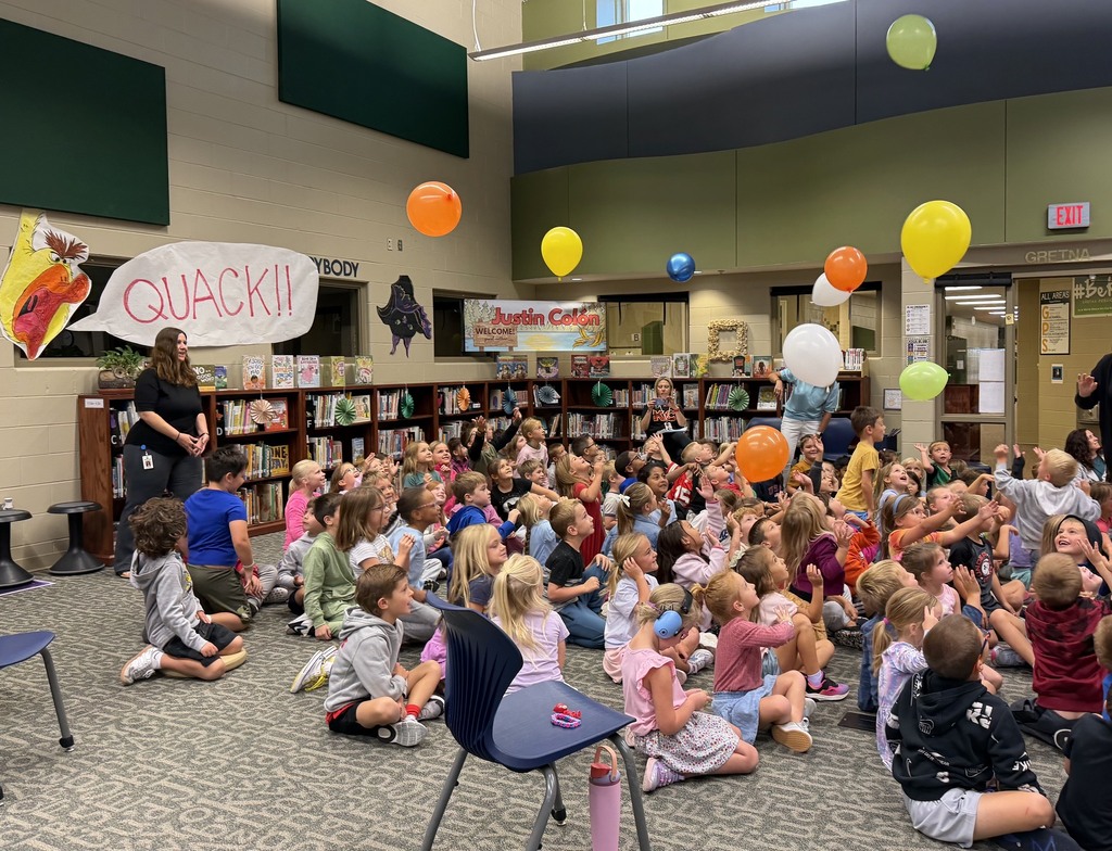 Kindergarten and 1st grade audience and balloons