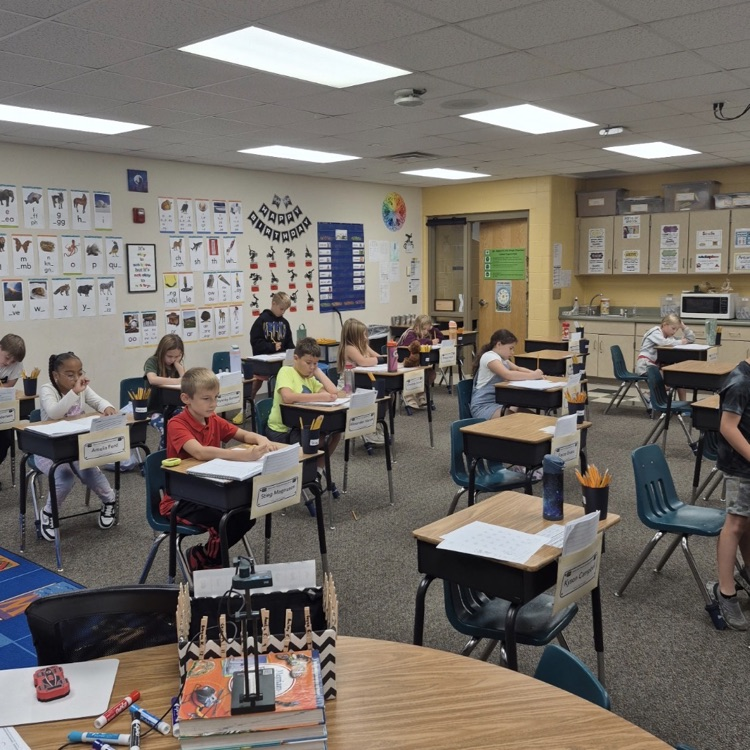 students working quietly at their seats