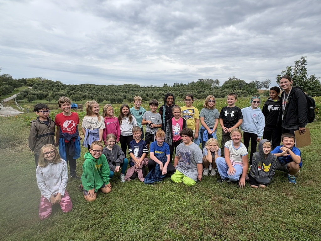 students smiling at a field trip at arbor day farms