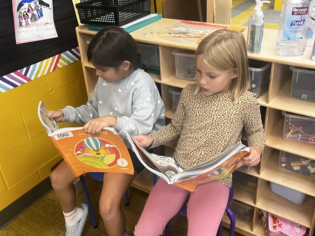 students reading in a second grade classroom