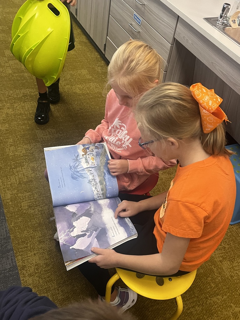 students reading in a second grade classroom