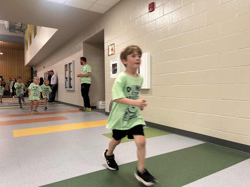 student running in the cafeteria for a fun run