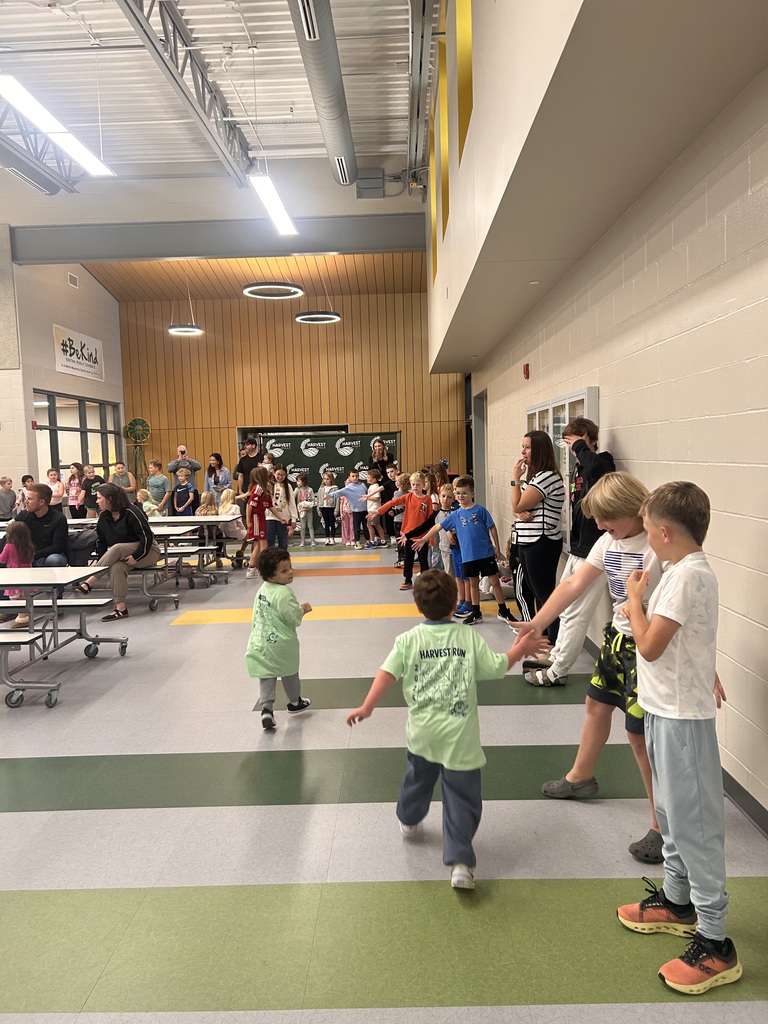 students running in the hallway for a fun run