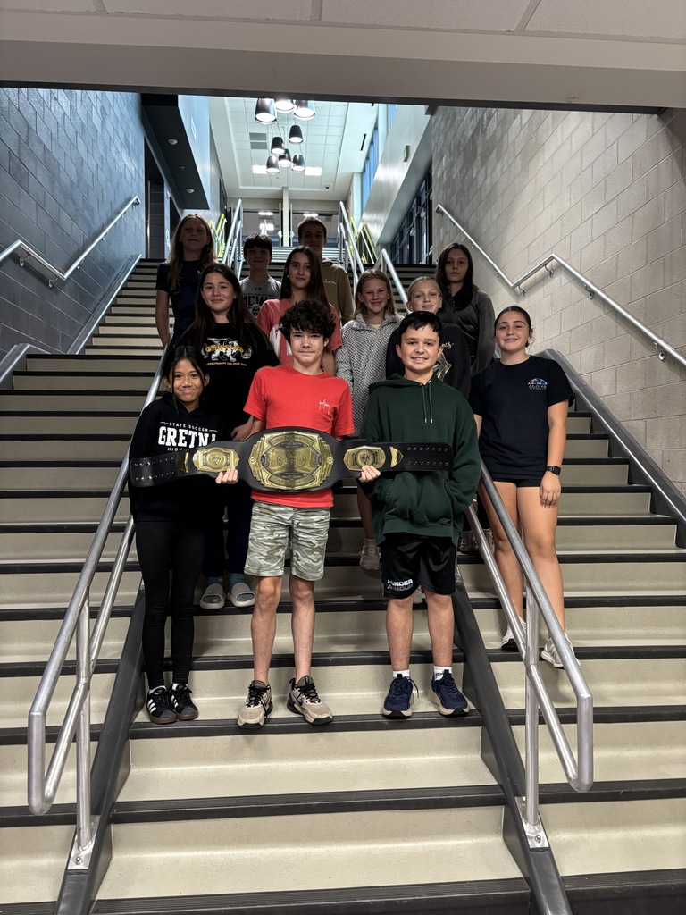 Photo of 7th grade students winning the moment at ACMS