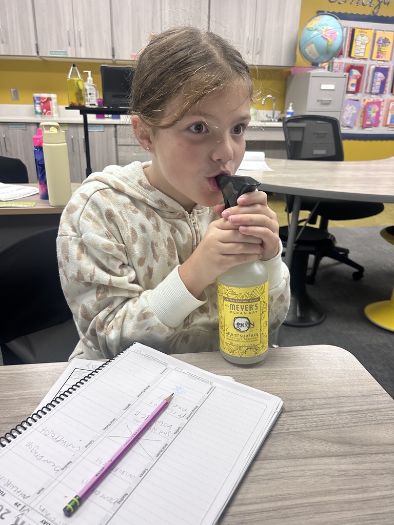 students drinking out of a spray bottle for anything but a water bottle day