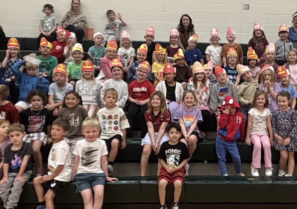 TES students sitting in the bleachers during the fire safety assembly.