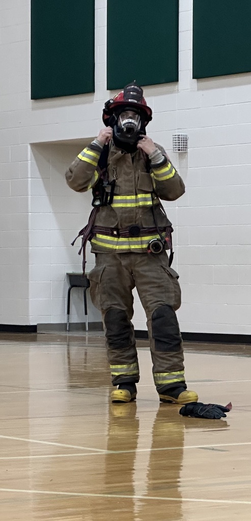 Firefighter in uniform in the TES gym.