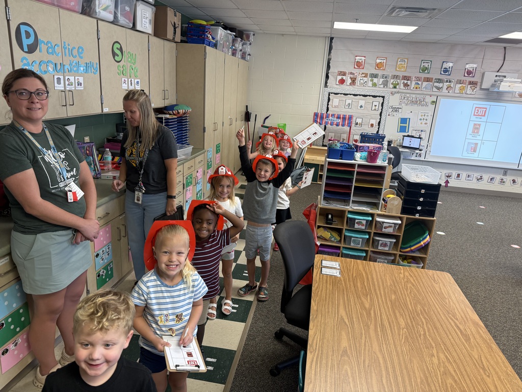 PM Class lined up, smiling, and ready to walk through the hallways