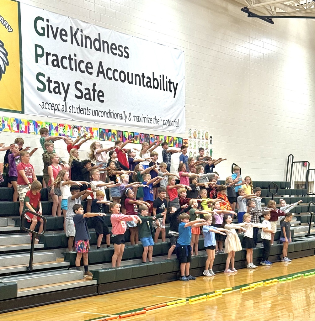 3rd Graders performing in the gym during their music performance