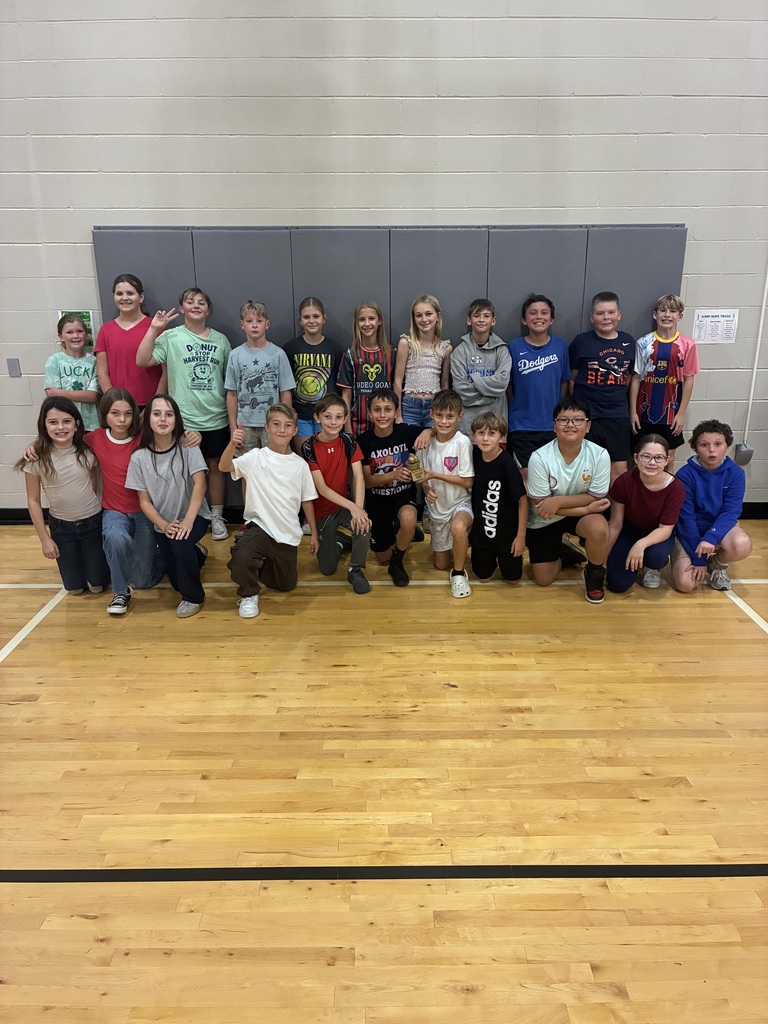 Students pose in gym class for the fastest class