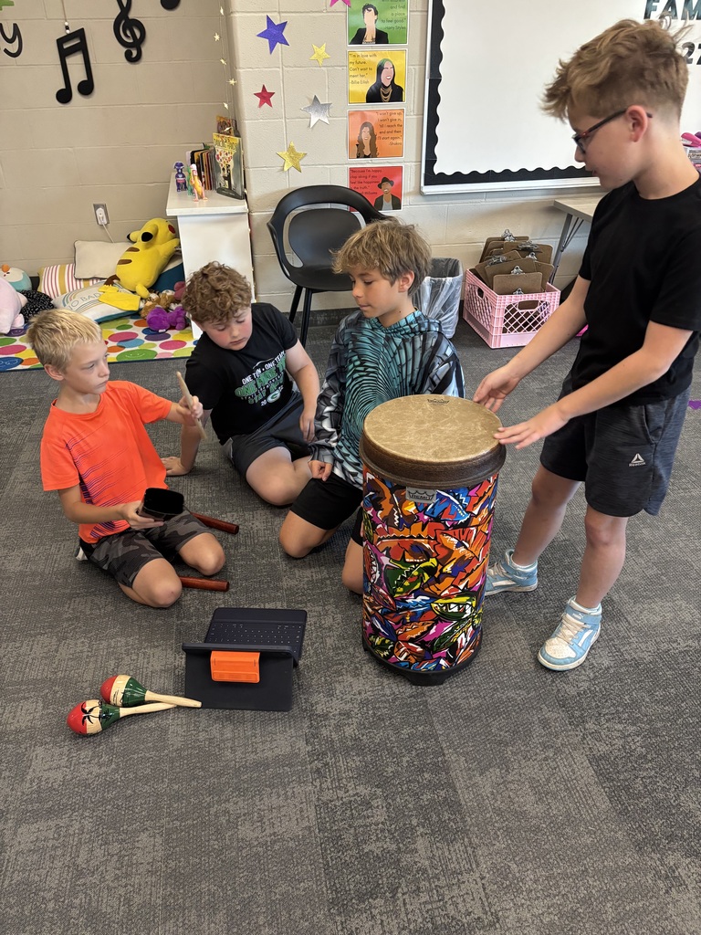 Students in Miss Beach's music class working hard on their drum ensembles