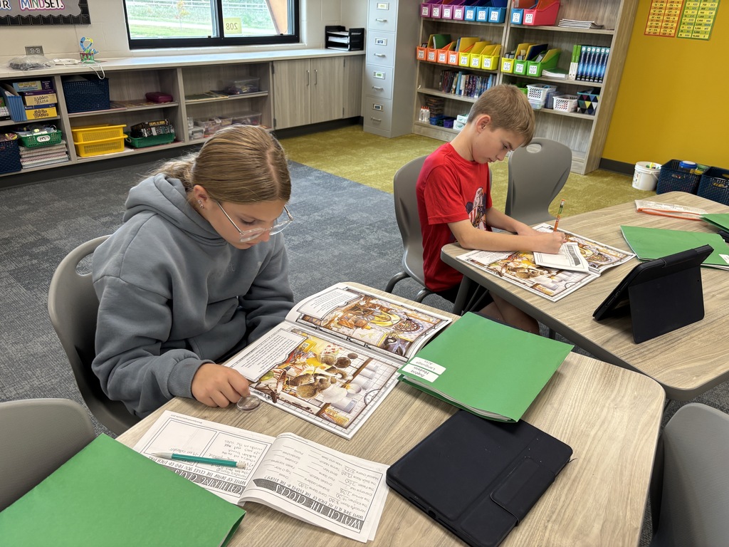 Harvest Hills HAL students working on a mystery case in the classroom.