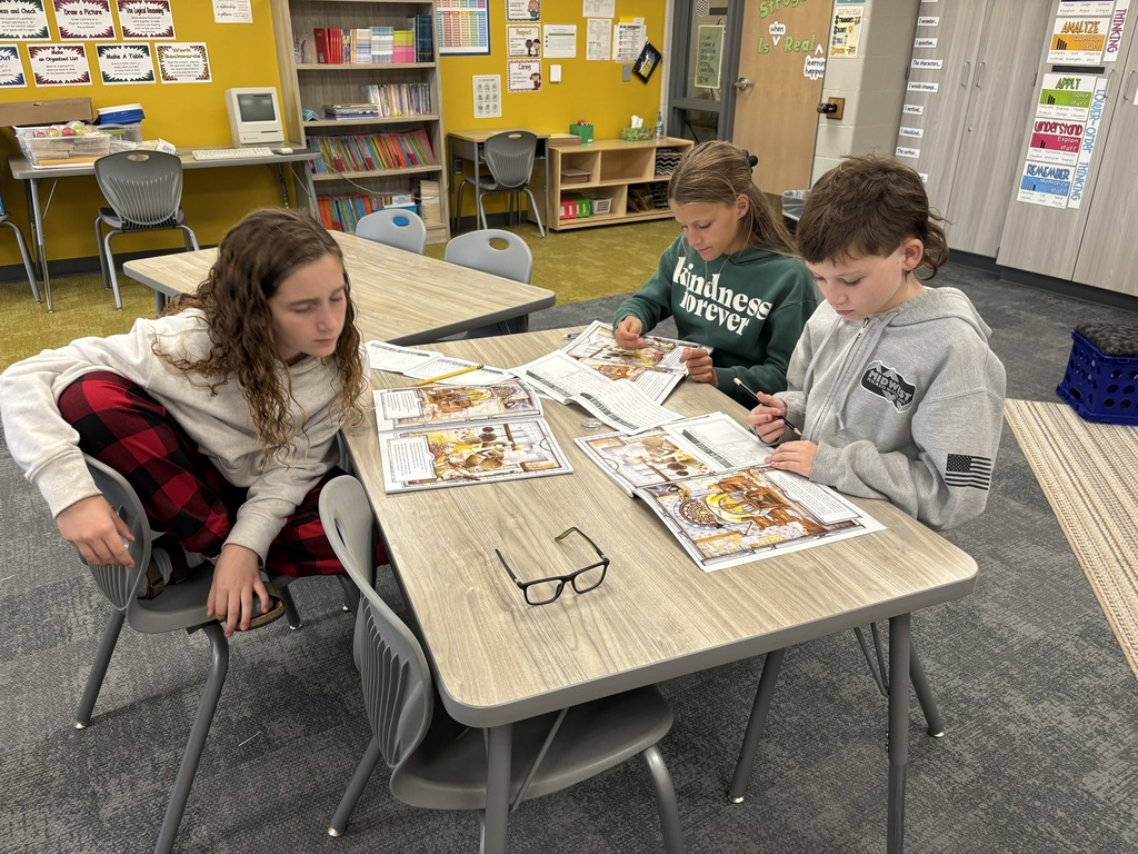 Harvest Hills HAL students working on a mystery case in the classroom.