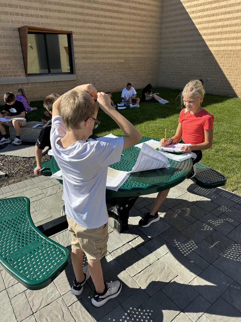 Harvest Hills students learning in the outdoor classroom.