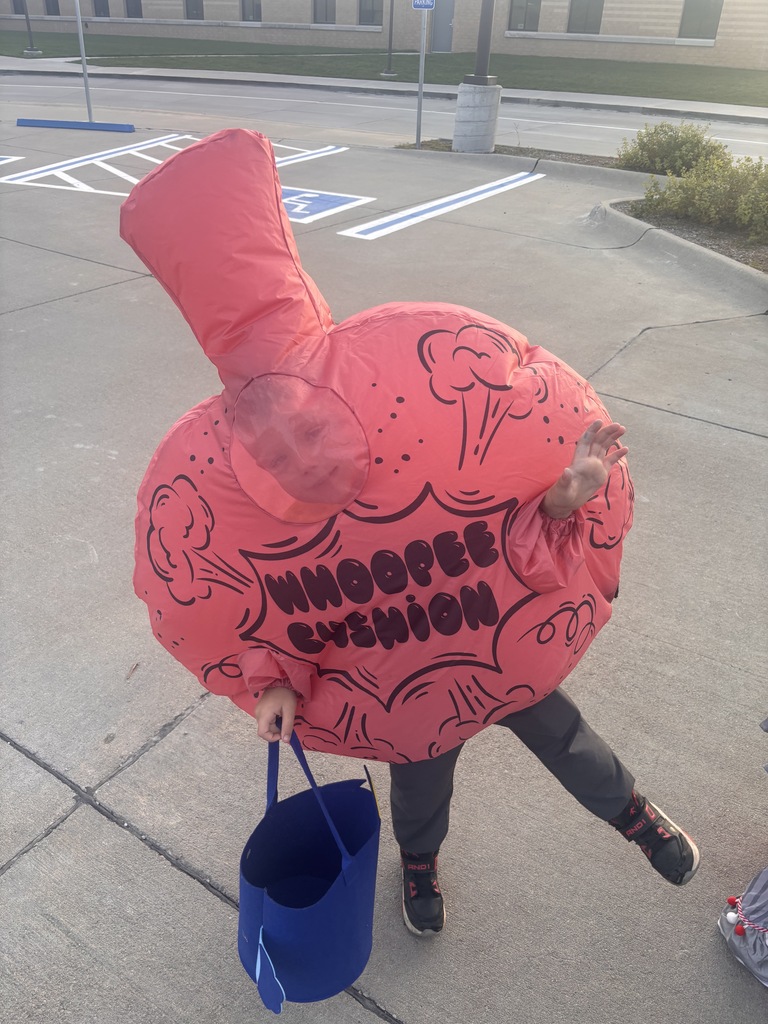Silly student in a costume at a school Trunk or Treat Event.