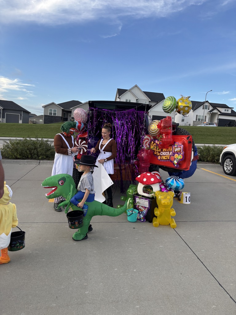 Adults with a trunk at the Harvest Hills Trunk or Treat Event.