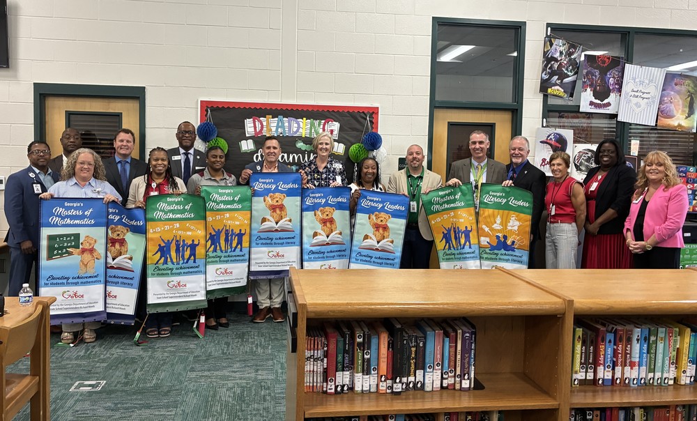 principals with banners