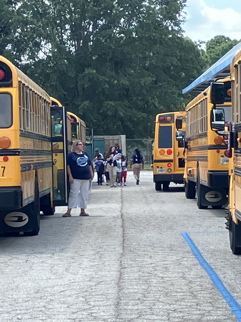 buses lined up, loading students