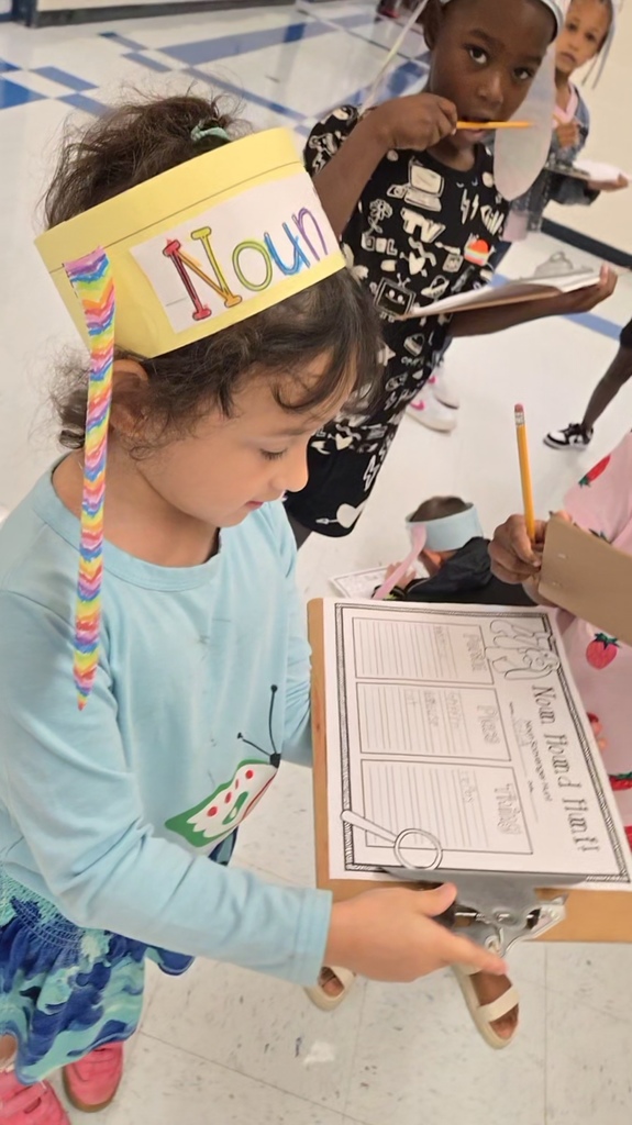 student holding clipboard
