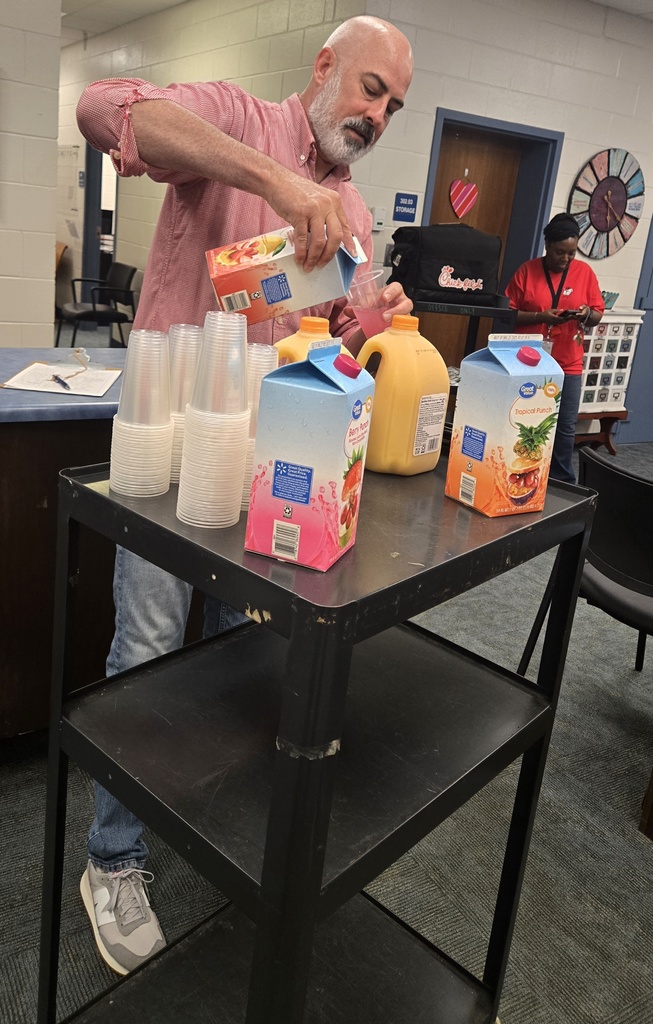 man putting juice at cart