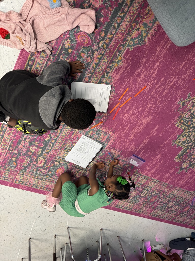 students on the floor using manipulatives to make compose and decompose numbers