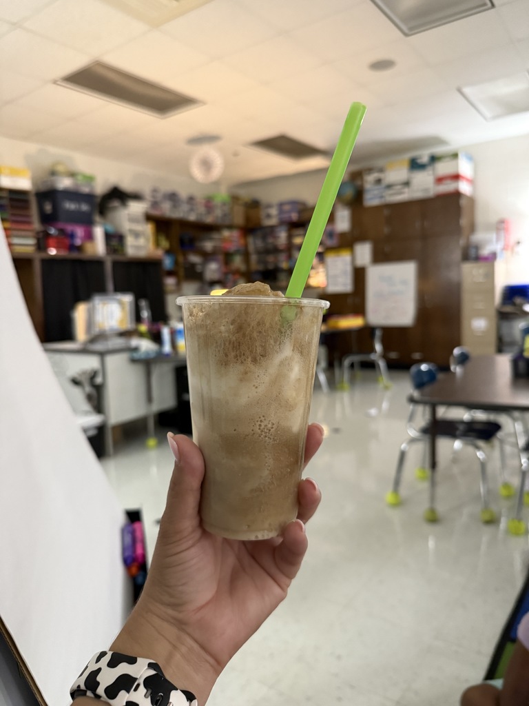 hand holding coke float