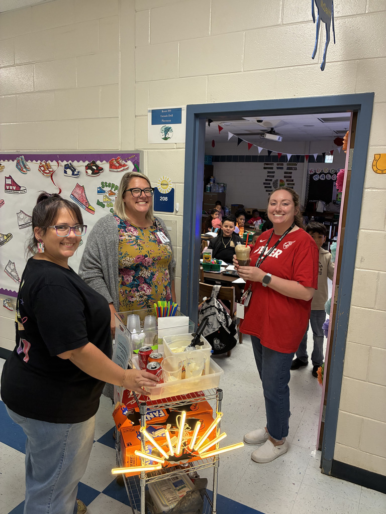 women giving and receiving coke and orange drink floats