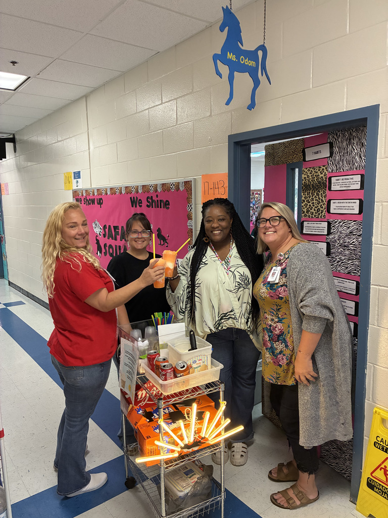 women giving and receiving coke and orange drink floats