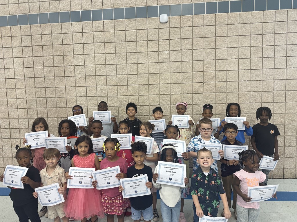 group pic of students with certificates