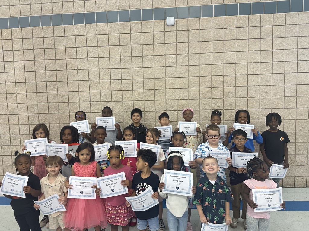 group pic of students with certificates