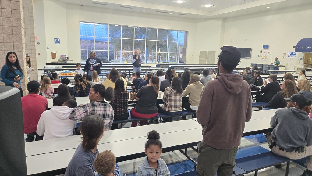 another pic of families and students in cafeteria