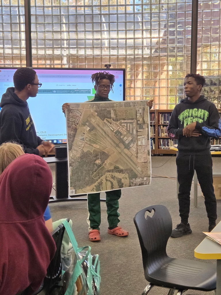 students with map