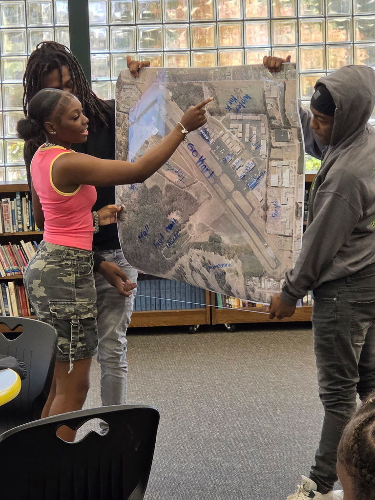 students with map