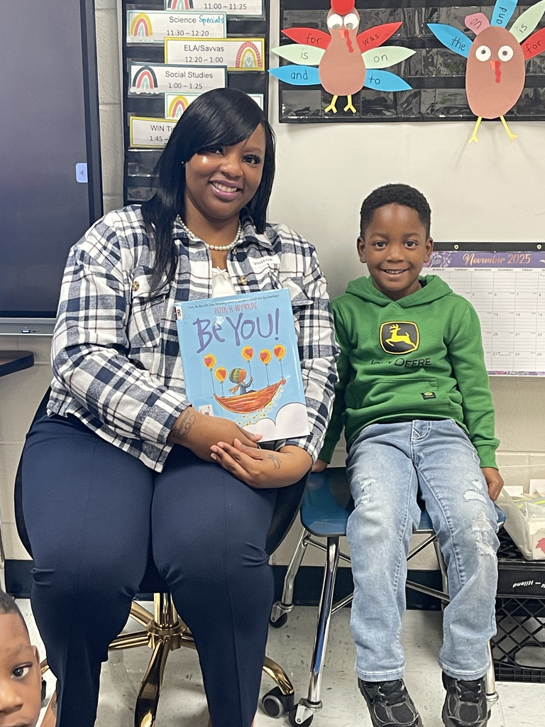 adult sitting with one child