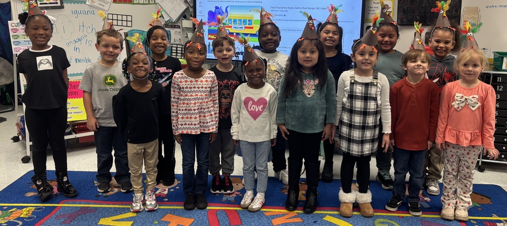 class of students with turkey hats