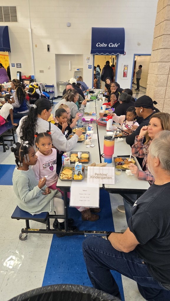 familes and students at cafeteria tables