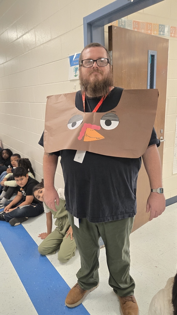 man in doorway dressed as turkey