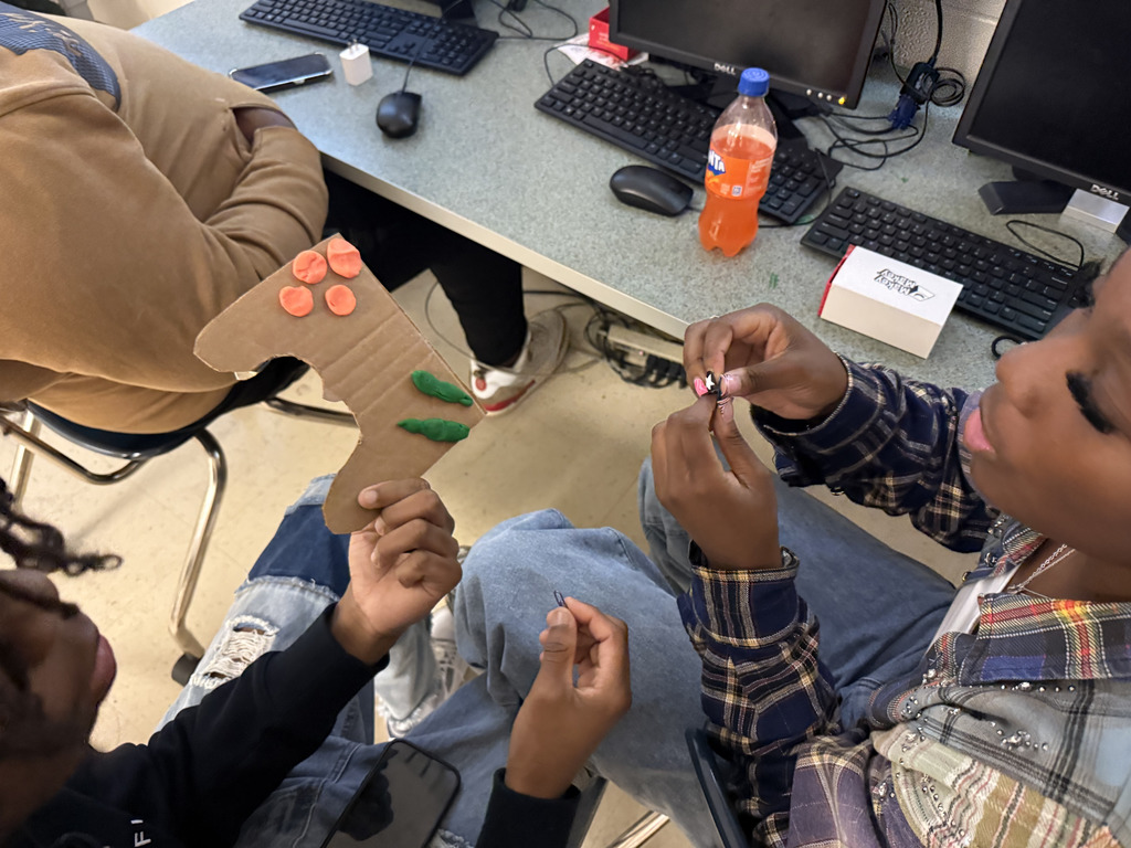 Students show off nearly completed controller