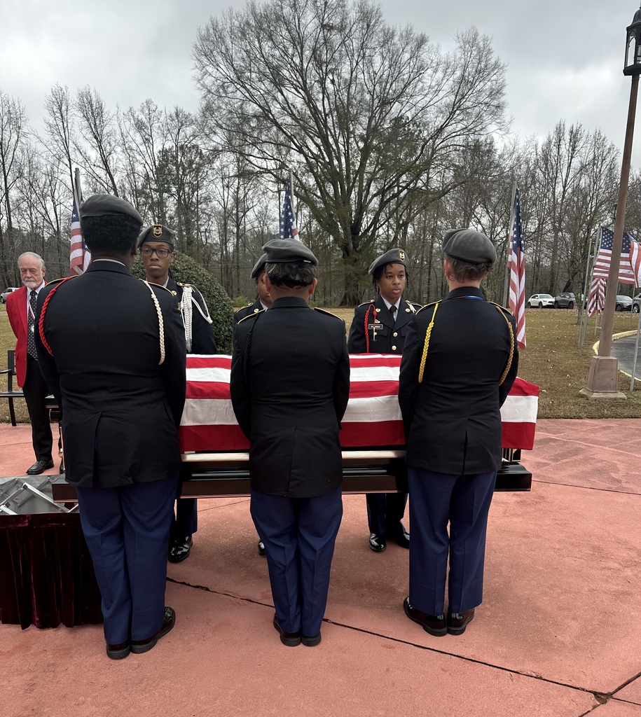 Cadets hold the coffin 