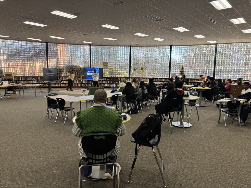 A student presents their pitch for historical shark tank