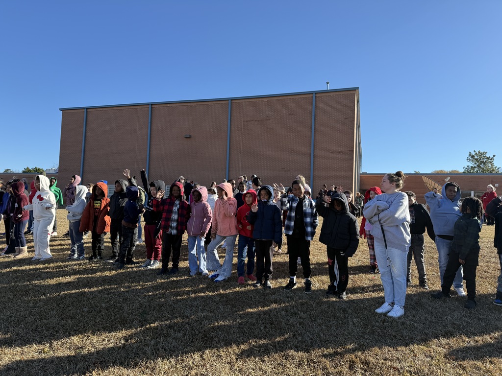 students on hill waiting