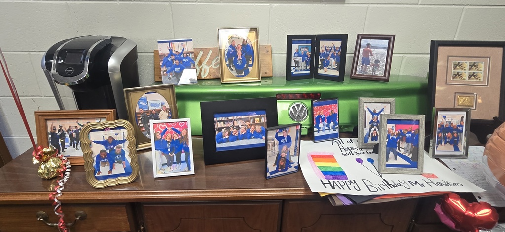 desk with framed photos