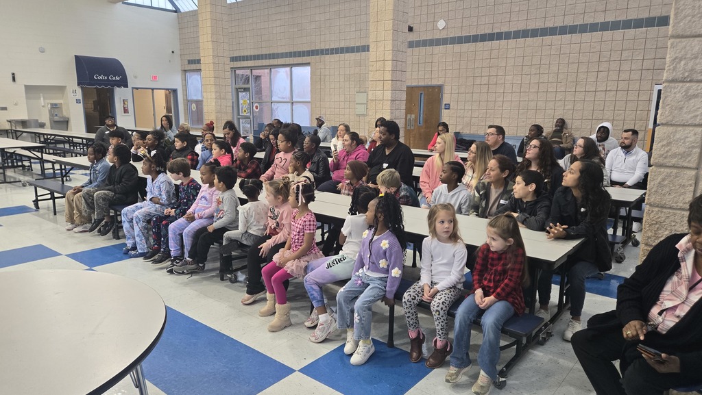 kids sitting at cafeteria tables
